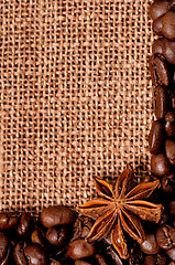 Image showing Coffee beans with spices on burlap sack 