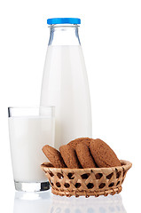 Image showing Bottle of milk and glass with cookies 
