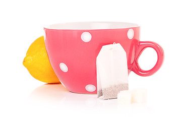 Image showing Tea cup with teabag and lemon