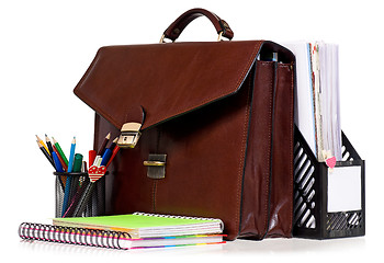 Image showing Brown leather briefcase with office accessories