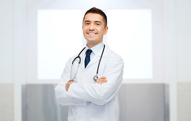 Image showing smiling male doctor in white coat