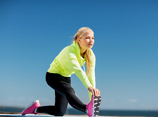 Image showing woman doing sports outdoors