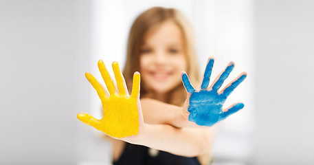 Image showing girl showing painted hands