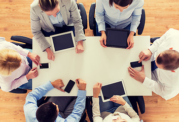 Image showing business team with smartphones and tablet pc