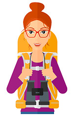 Image showing Cheerful backpacker with binoculars.