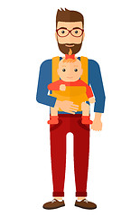 Image showing Man holding baby in sling.