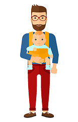 Image showing Man holding baby in sling.