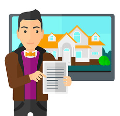 Image showing Real estate agent offering house.