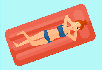 Image showing Woman relaxing in swimming pool.