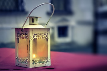 Image showing Lantern outside on table