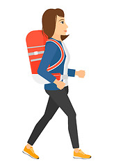 Image showing Woman with backpack hiking.