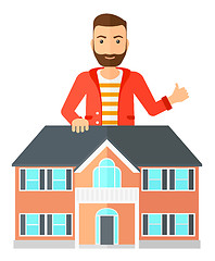 Image showing Real estate agent showing thumb up.