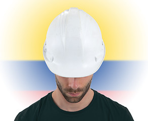 Image showing Engineer with flag on background - Colombia