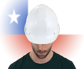 Image showing Engineer with flag on background - Chile