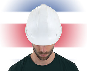 Image showing Engineer with flag on background - Costa Rica