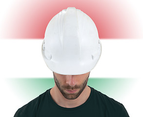 Image showing Engineer with flag on background - Hungary