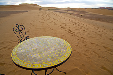 Image showing table and seat yellow sand