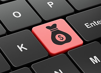 Image showing Finance concept: Money Bag on computer keyboard background