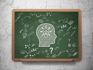 Image showing Learning concept: Head With Light Bulb on School Board background