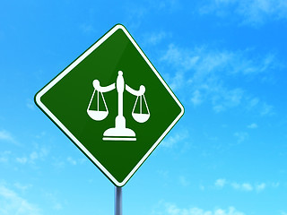 Image showing Law concept: Scales on road sign background