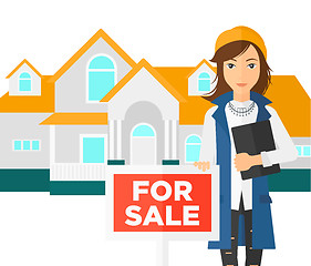 Image showing Real estate agent offering house.