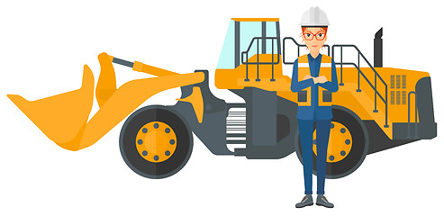 Image showing Miner with mining equipment on background.