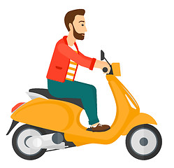 Image showing Man riding scooter.