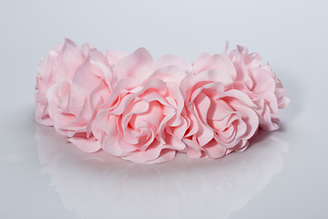Image showing tiara of artificial  roses on a light background
