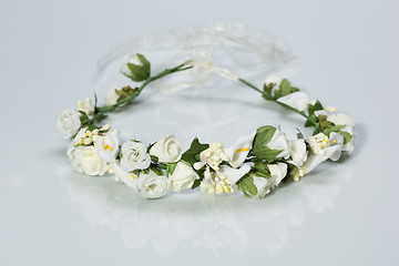 Image showing tiara of artificial  roses on a light background