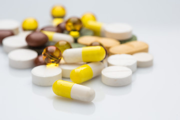 Image showing Pile of various colorful pills isolated on white