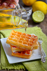 Image showing waffles with honey and lemon