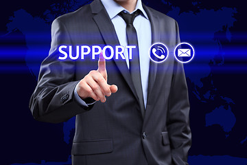 Image showing business, technology, networking concept - businessman pressing support button on virtual screens