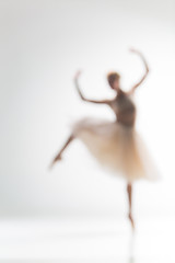 Image showing Blurred silhouette of ballerina on white background