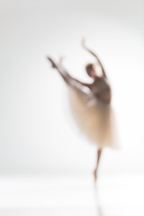 Image showing Blurred silhouette of ballerina on white background