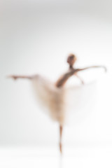 Image showing Blurred silhouette of ballerina on white background