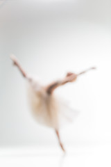 Image showing Blurred silhouette of ballerina on white background