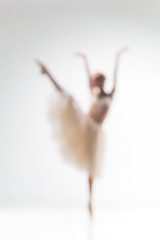 Image showing Blurred silhouette of ballerina on white background