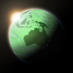 Image showing Sun over Australia on green planet Earth