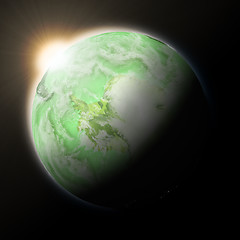 Image showing Sun over Antarctica on green planet Earth