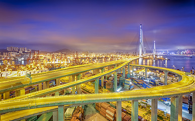 Image showing hong kong modern city High speed traffic and blurred light trail