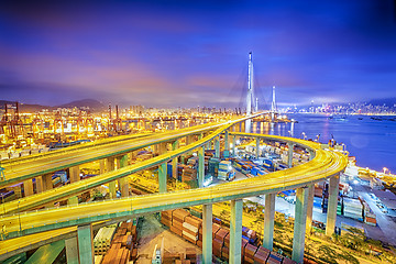 Image showing hong kong modern city High speed traffic and blurred light trail