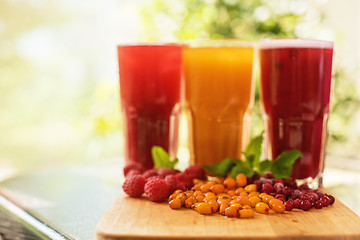 Image showing fruit drink with cranberries raspberries and sea buckthorn