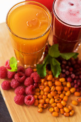 Image showing fruit drink with cranberries raspberries and sea buckthorn