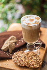 Image showing coffee latte cup with cookies