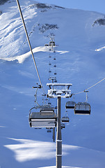 Image showing Chair-lift at early morning after snowfall