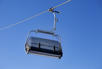 Image showing Chair-lift and blue sky