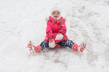 Image showing Girl having fun rolling ice slides