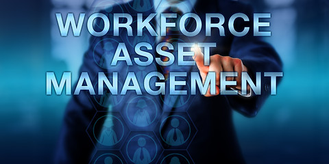 Image showing Manager Touching WORKFORCE ASSET MANAGEMENT