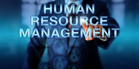 Image showing Manager Pressing HUMAN RESOURCE MANAGEMENT