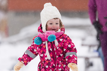 Image showing little girl at snowy winter day